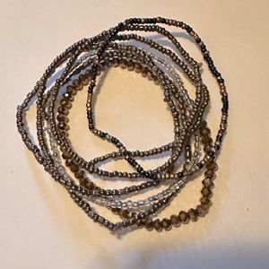 Bundle of beaded stretchy stacking bracelets